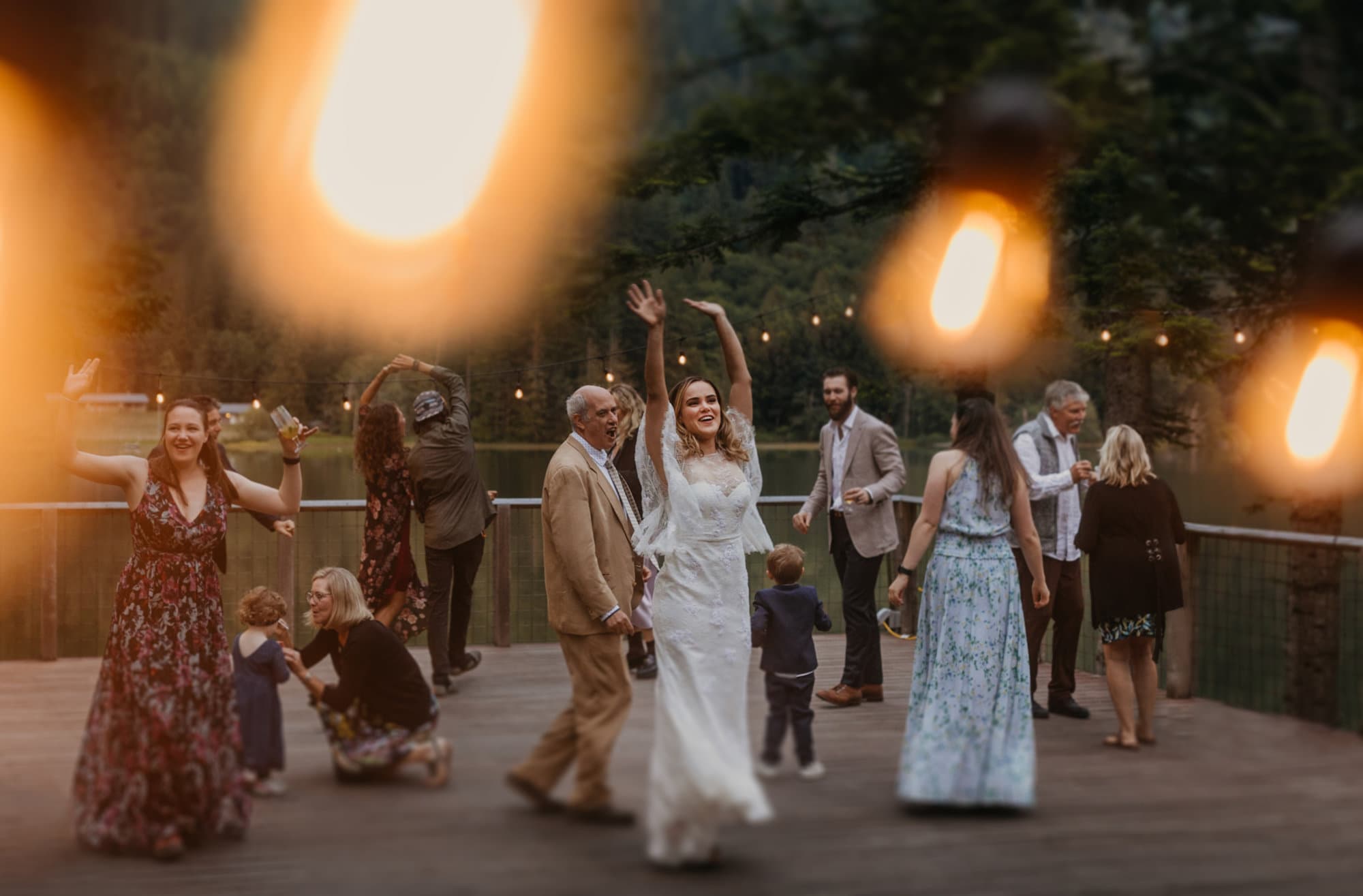 The bride dances the night away under the twinkle lights.