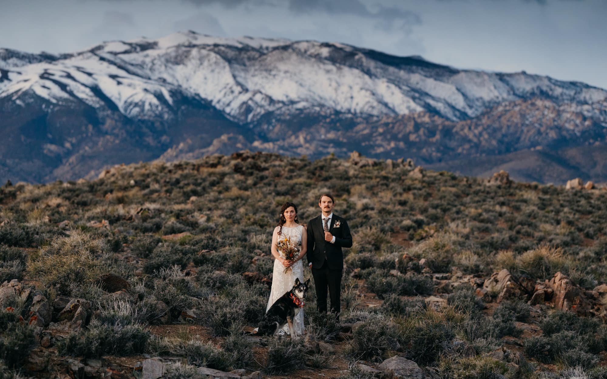 An American Gothic inspired portrait of a couple in the mountains.