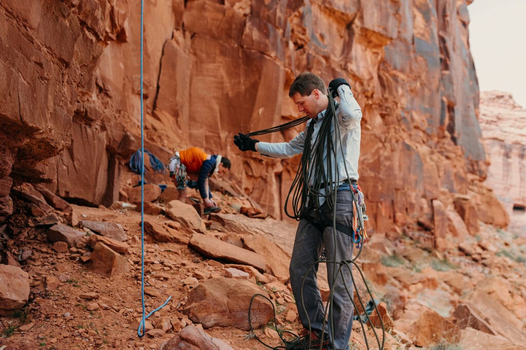 The couple organizing their gear after making it back to the base of the climb.