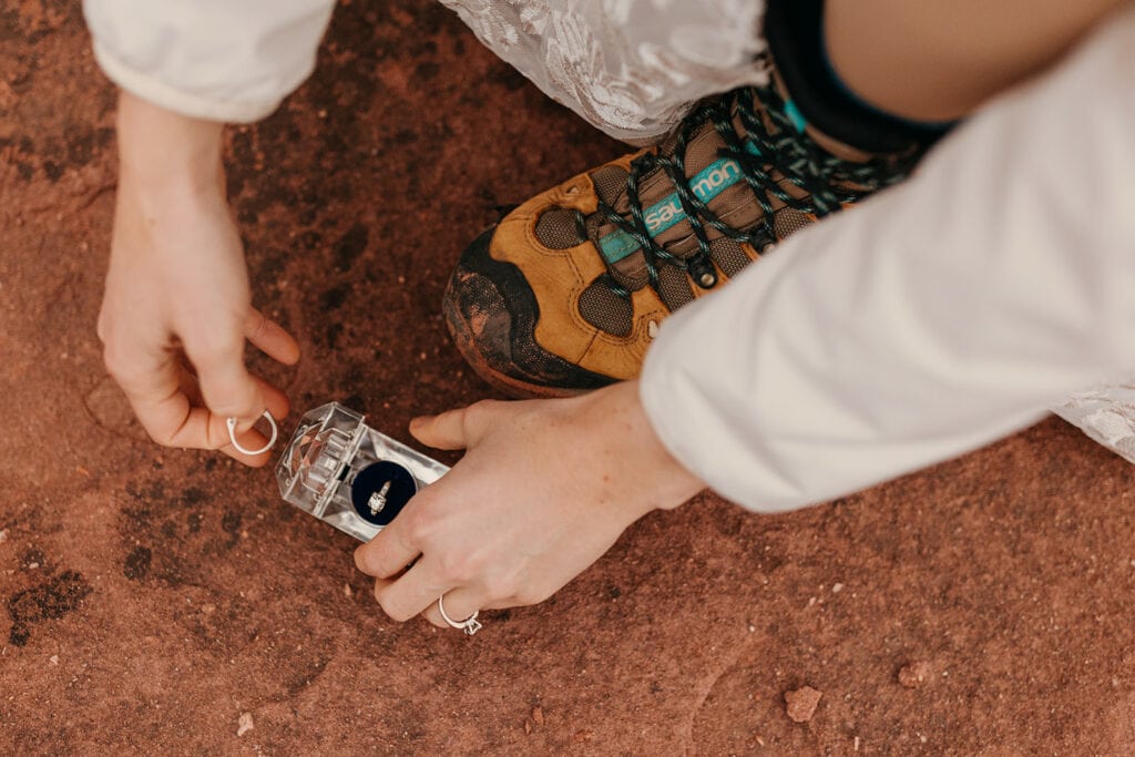 The bride picks which of her heirloom rings to wear.