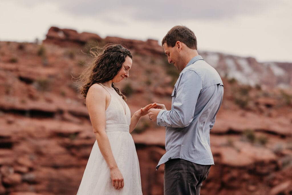 The couple exchanges rings.