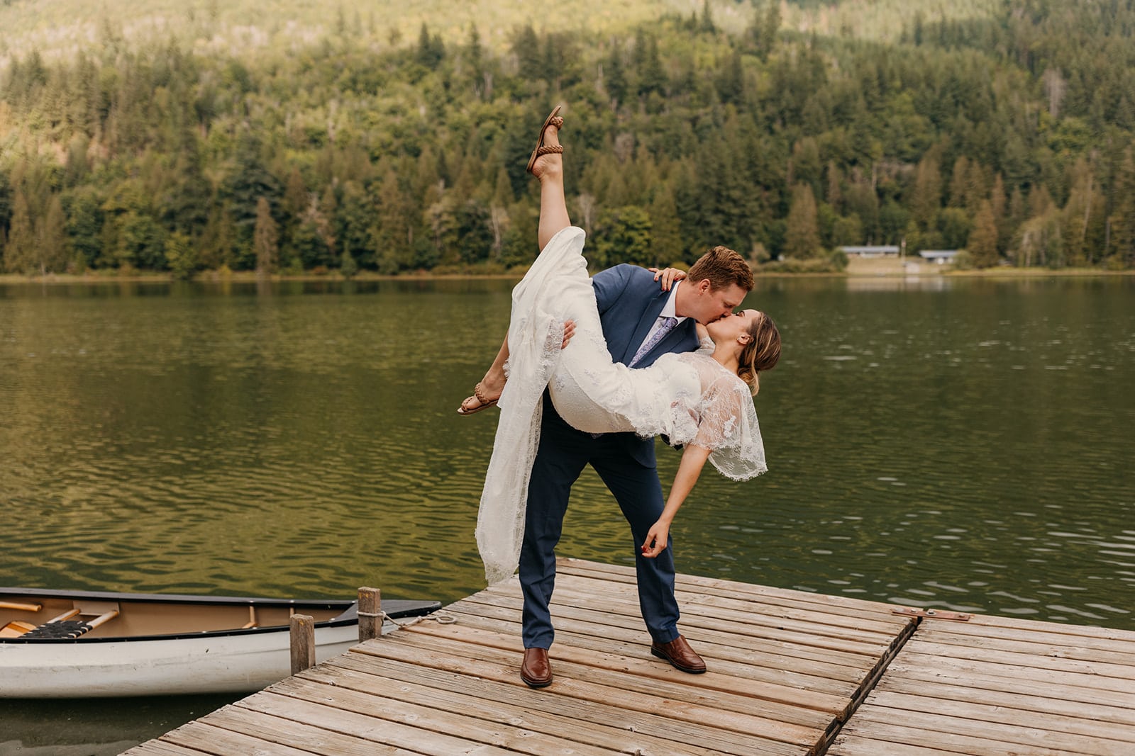 The couple shares a passionate kiss at camp.