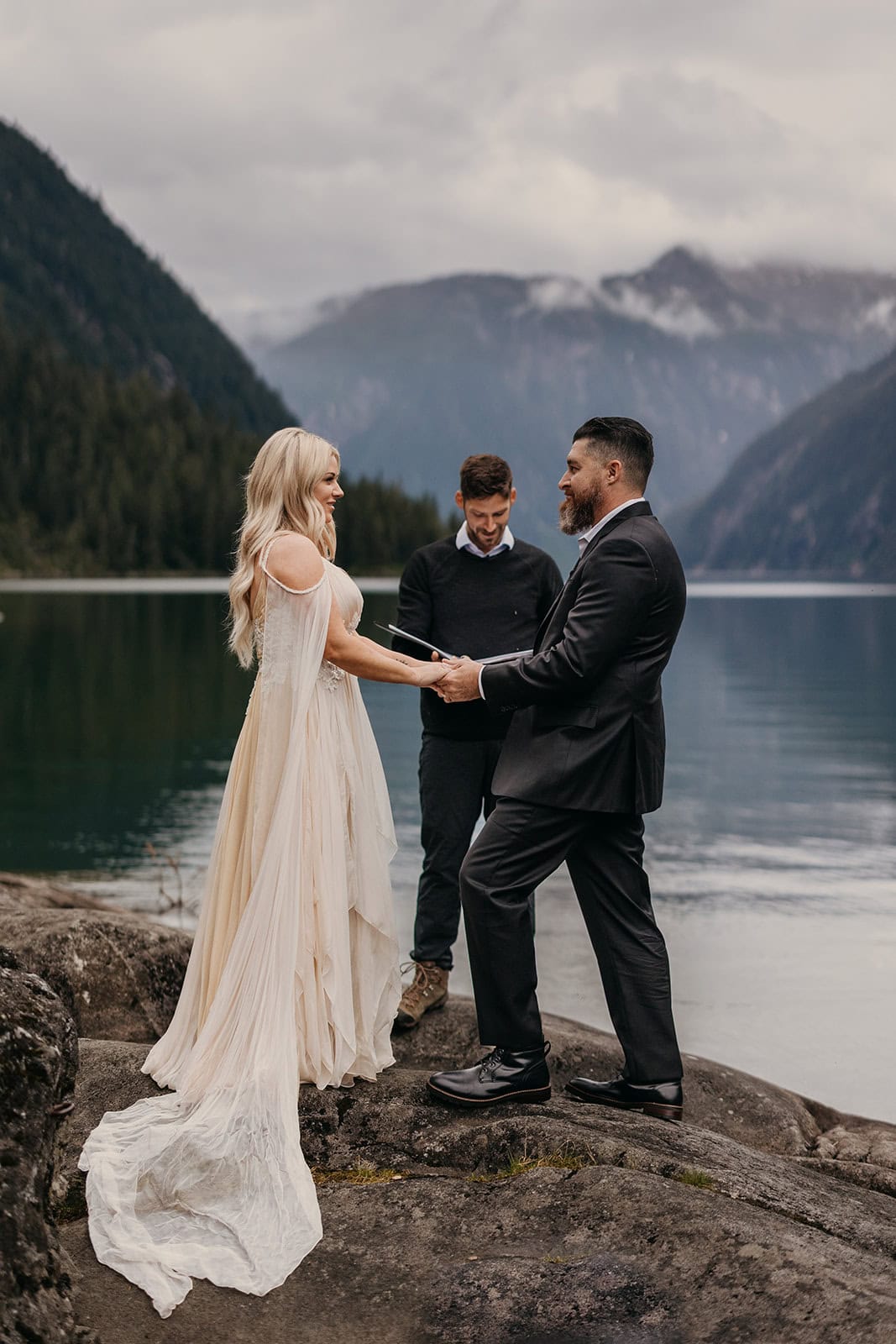 An officiant performs the elopement ceremony in Juneau.