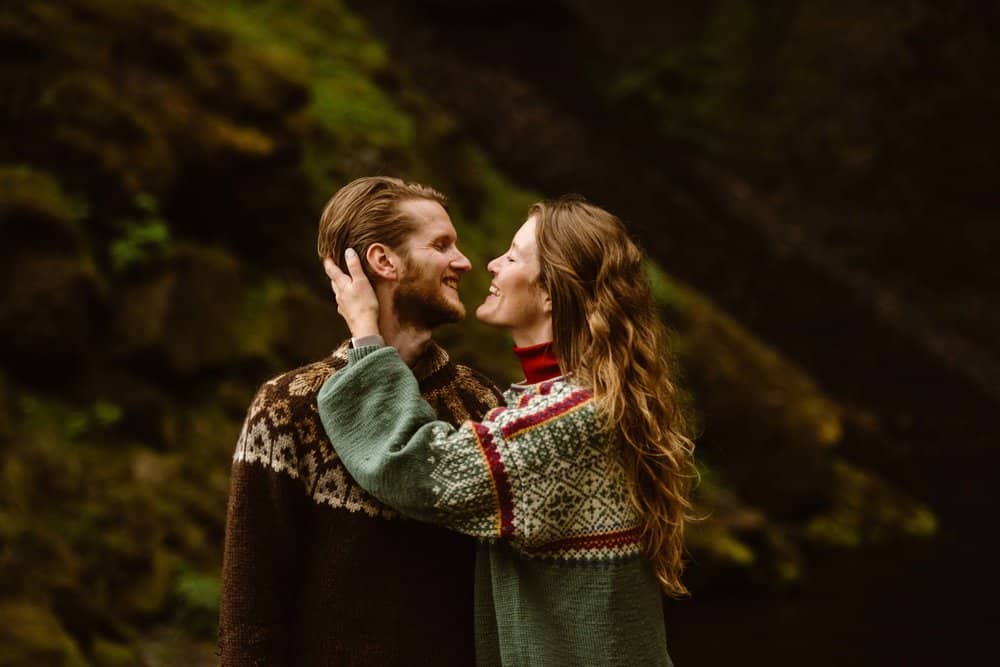 A couple wearing traditional Icelandic sweaters.