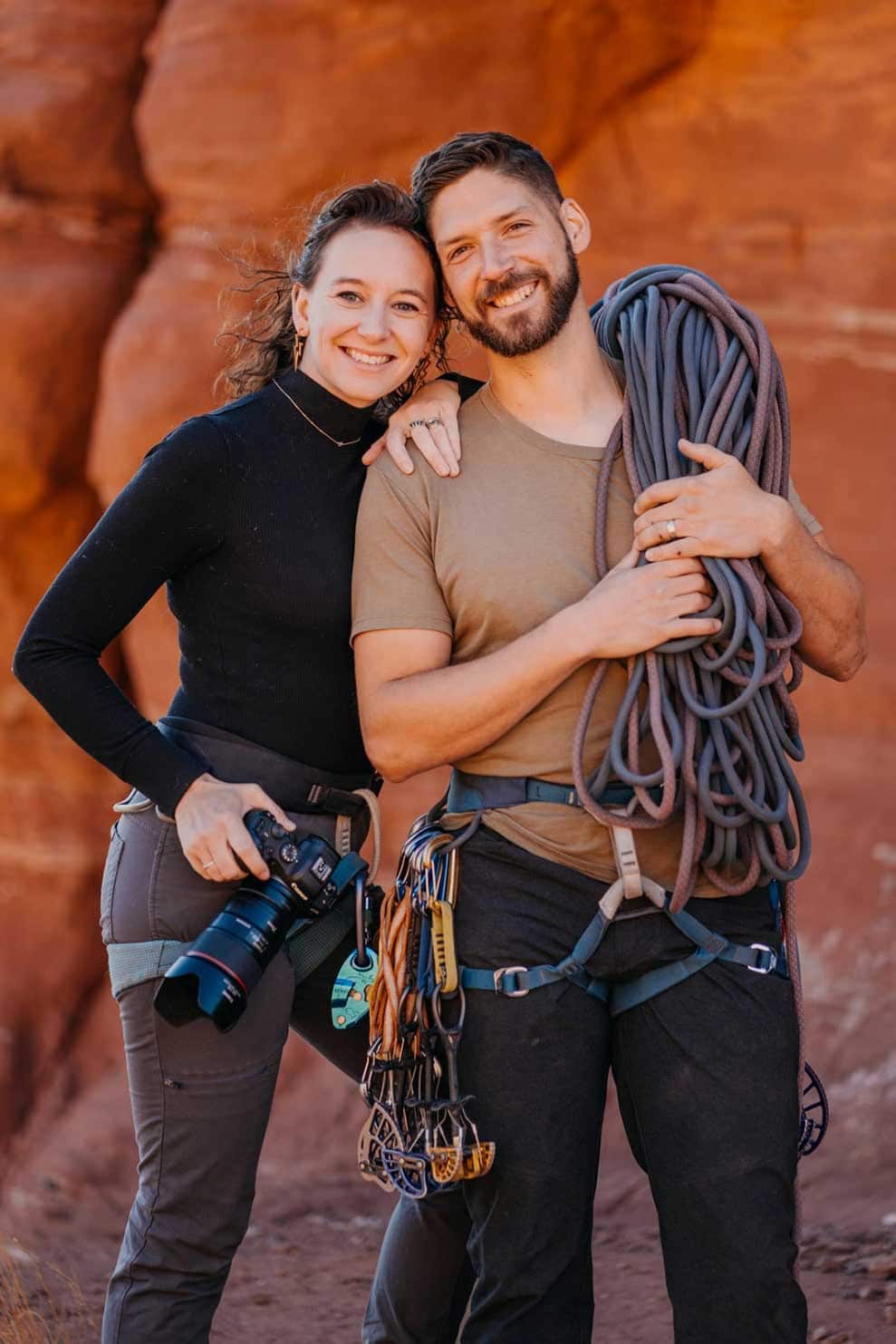 A portrait of a husband and wife elopement photography team.