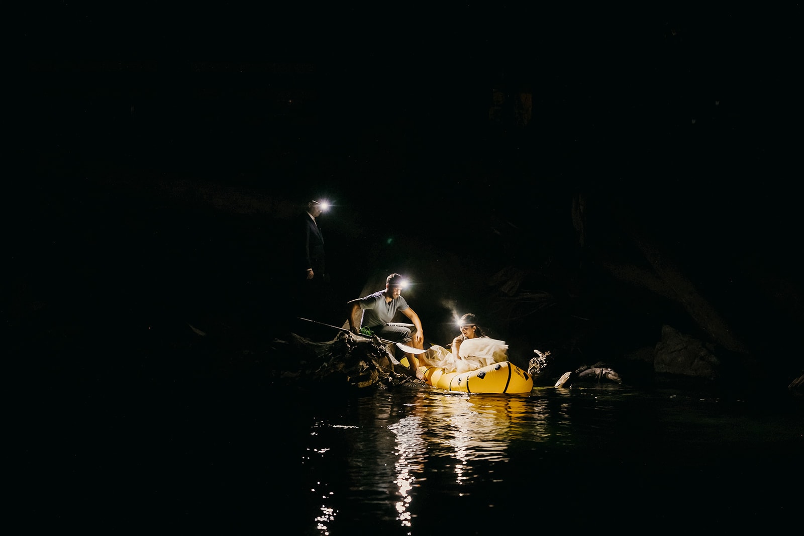 The bride getting into the packraft for star photos.