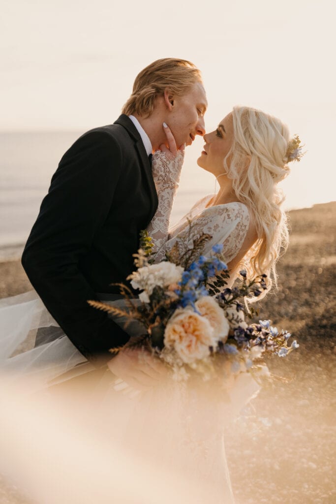 A couple holds each other.